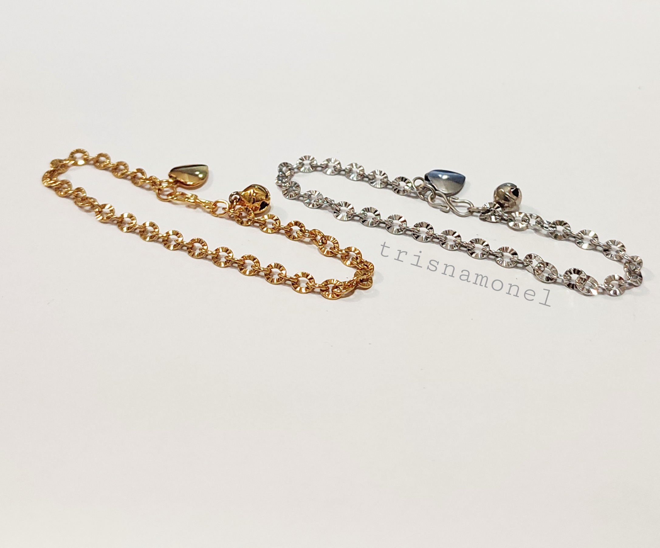 GELANG TITANIUM MOTIF SINAR GOLD DAN SILVER